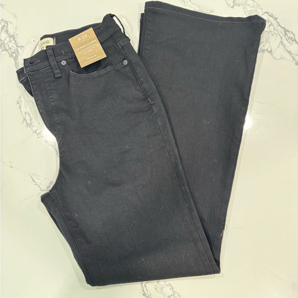 Madewell black skinny flares. Size 28. New with tags.